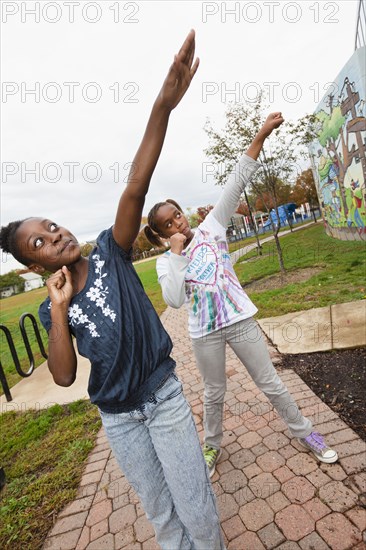 Black girls practicing cheer leading