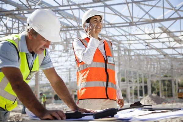 Architects working at construction site