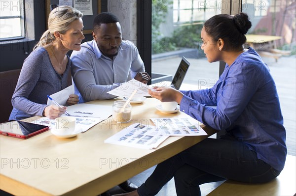 Business people talking in office meeting