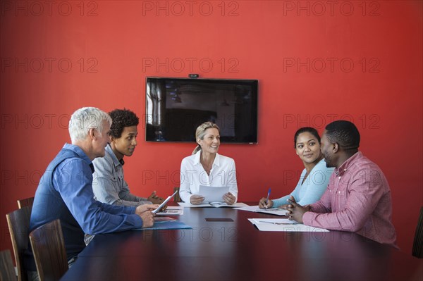 Business people talking in conference room meeting