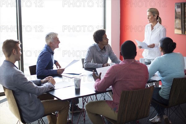 Business people talking in conference room meeting