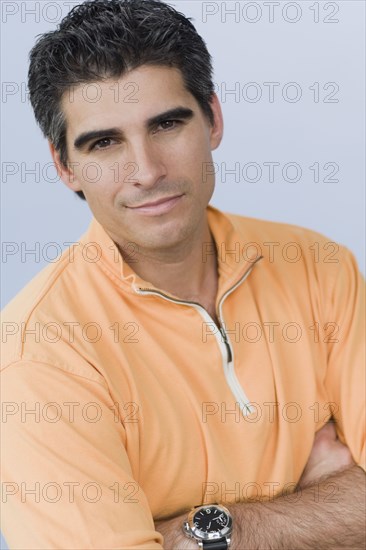 Close up of Cuban man with arms crossed
