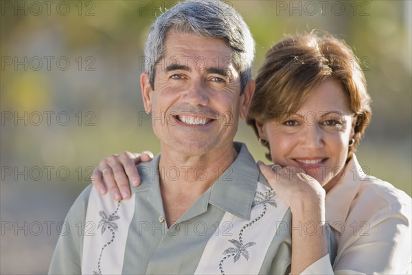 Cuban couple hugging