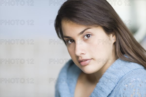 Close up of Brazilian teenager looking serious