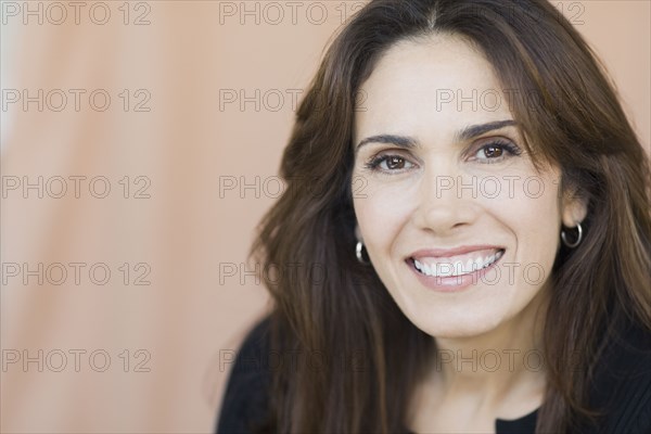 Close up of mixed race woman smiling