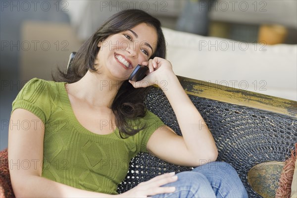 Cuban woman talking on cell phone