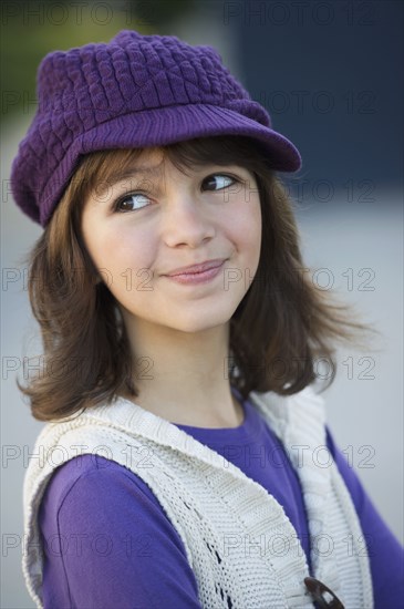 Smiling Caucasian girl in cap