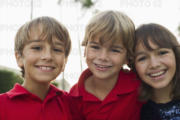 Smiling Caucasian boys and girl