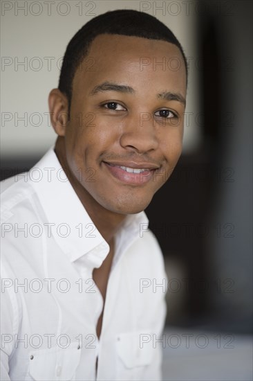 Smiling mixed race man