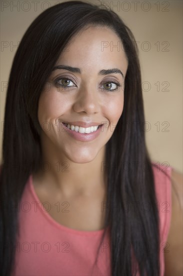 Smiling mixed race woman