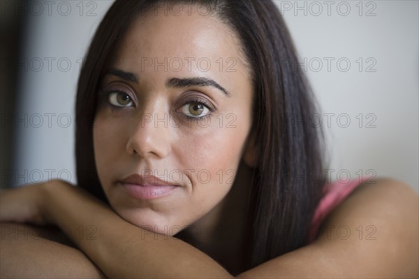 Serious mixed race woman