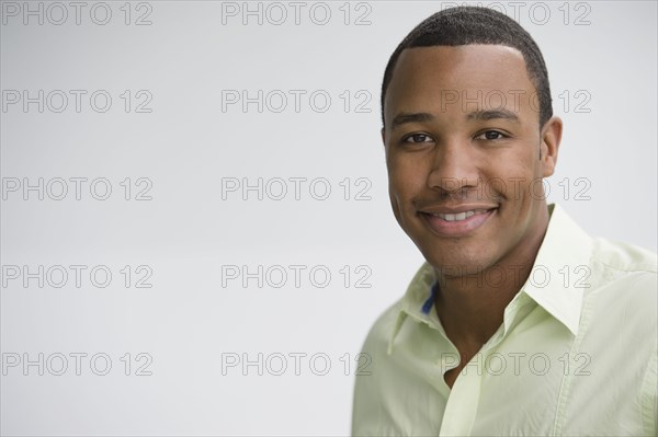 Smiling mixed race man