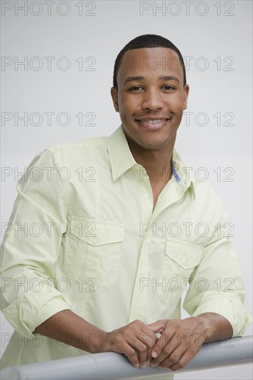 Smiling mixed race man