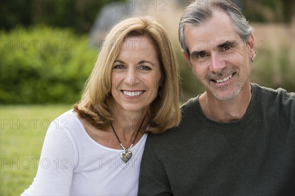 Caucasian couple smiling outdoors