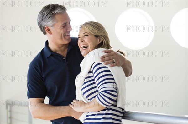Caucasian couple laughing together