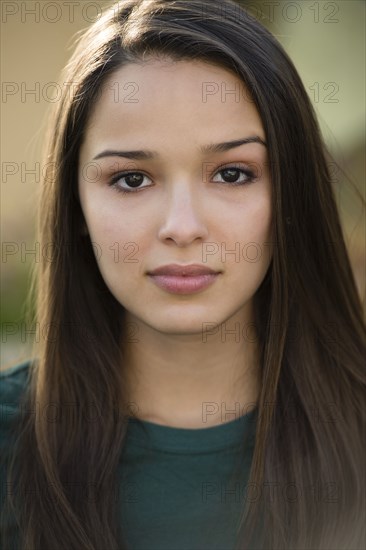 Hispanic woman with worried expression