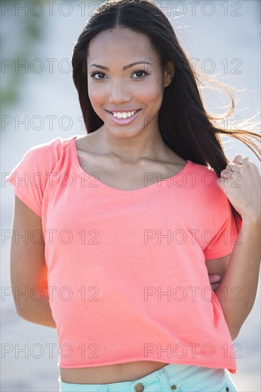 Hispanic woman smiling outdoors