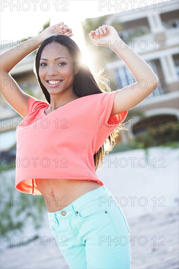 Hispanic woman smiling outdoors