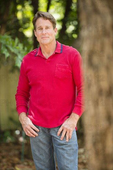 Caucasian man standing in park