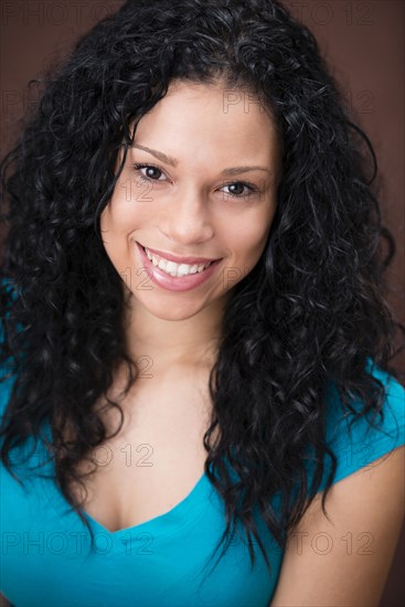 Mixed race woman smiling