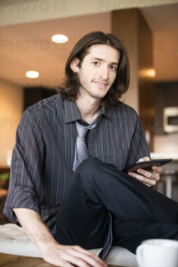 Caucasian businessman using digital tablet