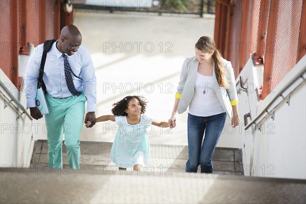 Family walking up stairs
