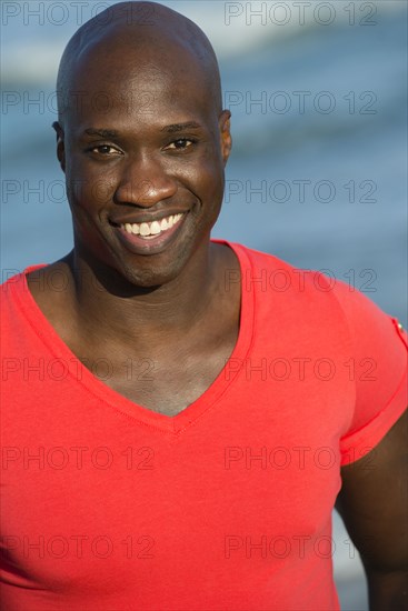 African American man smiling outdoors