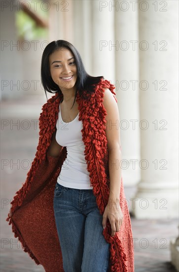 Black woman wearing draping vest