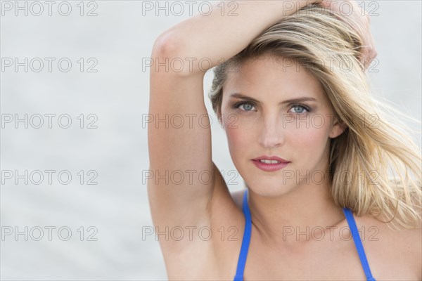 Caucasian woman wearing bikini on beach