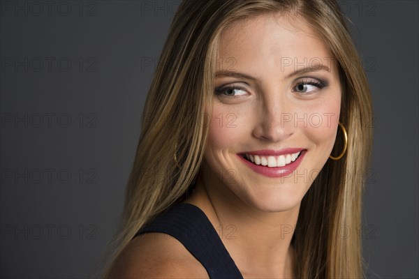 Close up of smiling Caucasian woman