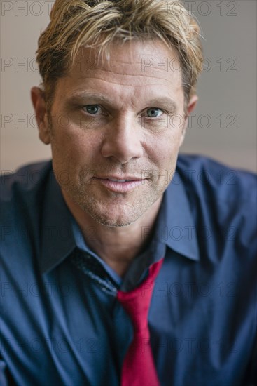 Close up of smiling Caucasian businessman