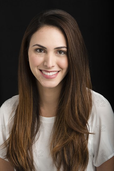 Close up of Hispanic woman smiling