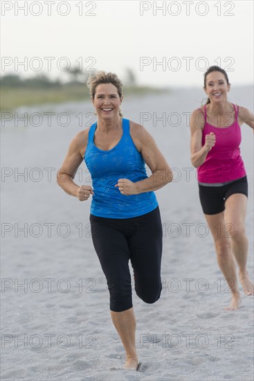 Women running on beach