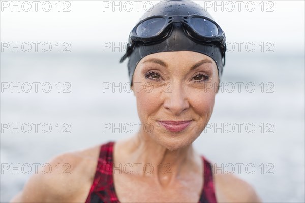 Caucasian swimmer smiling