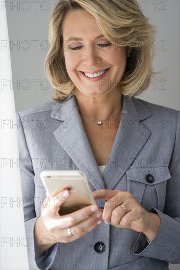 Caucasian businesswoman using digital tablet