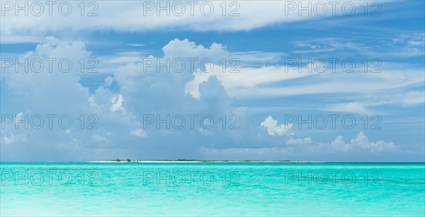 Tropical ocean under blue sky