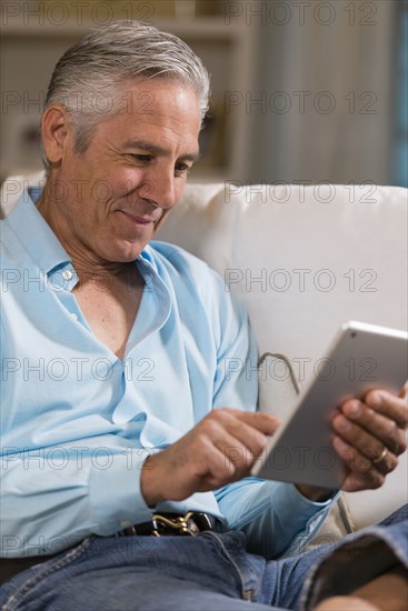 Caucasian businessman using digital table