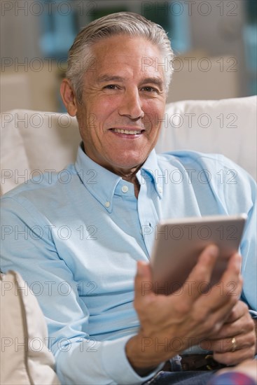 Caucasian businessman using digital tablet