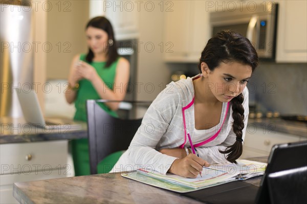 Mixed race girl doing homework