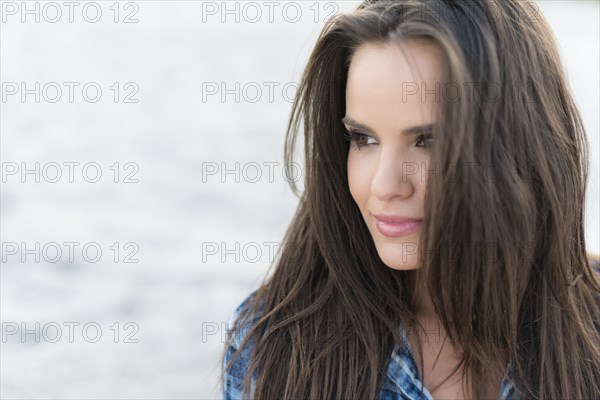 Hispanic woman smiling outdoors