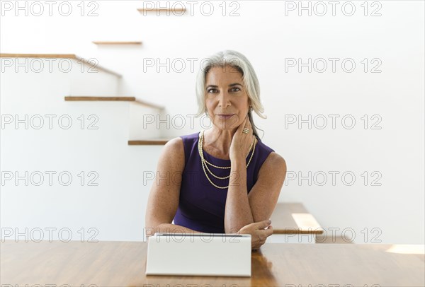 Caucasian woman using digital tablet