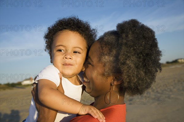 African mother holding baby boy