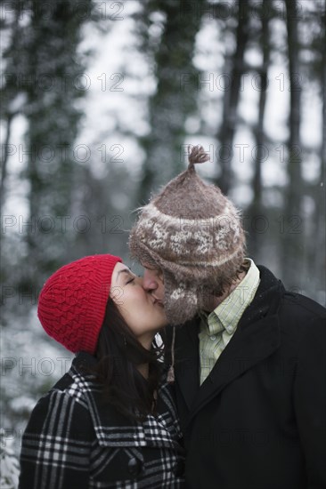 Couple kissing outdoors