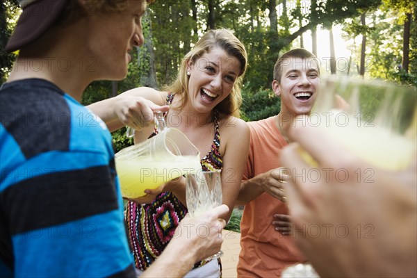 Friends hanging out together drinking lemonade