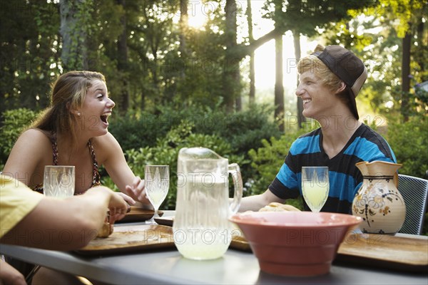 Friends hanging out together drinking lemonade