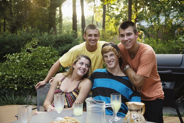 Friends hanging out together drinking lemonade