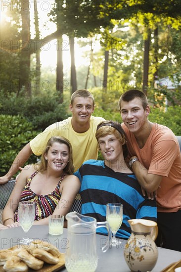 Friends hanging out together drinking lemonade