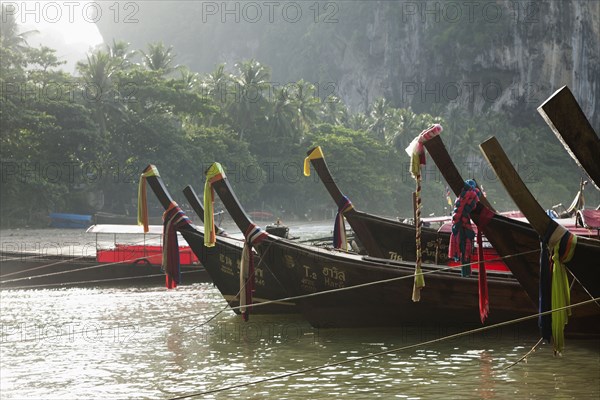 Thai boats moored in ocean