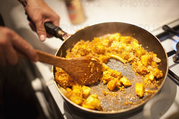 Close up of person making pad thai