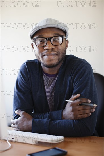 Black businessman working at desk